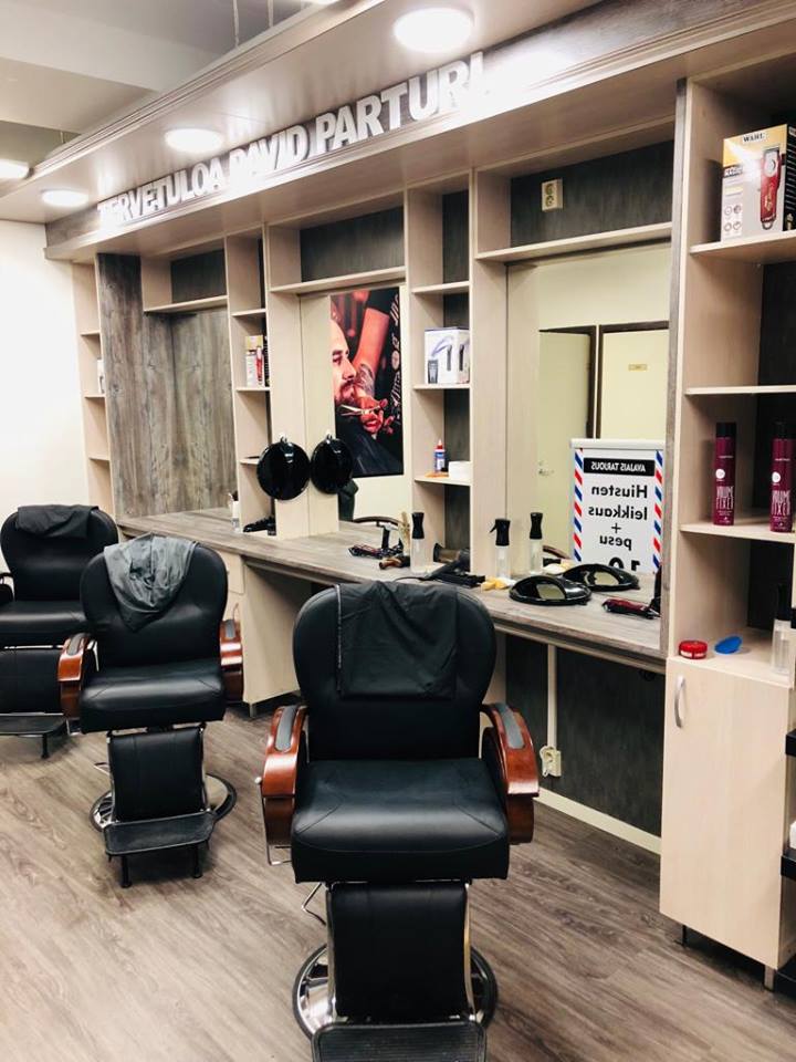David Parturi shop interior with black barber chairs